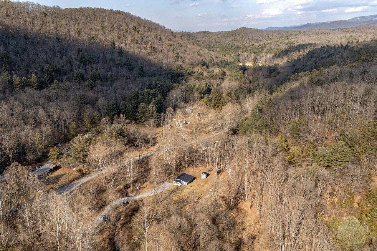 29 Shenandoah Mountain Road Sugar Grove, WV 26815 - Photo 38 of 52 a view of a dry yard with mountains in the background