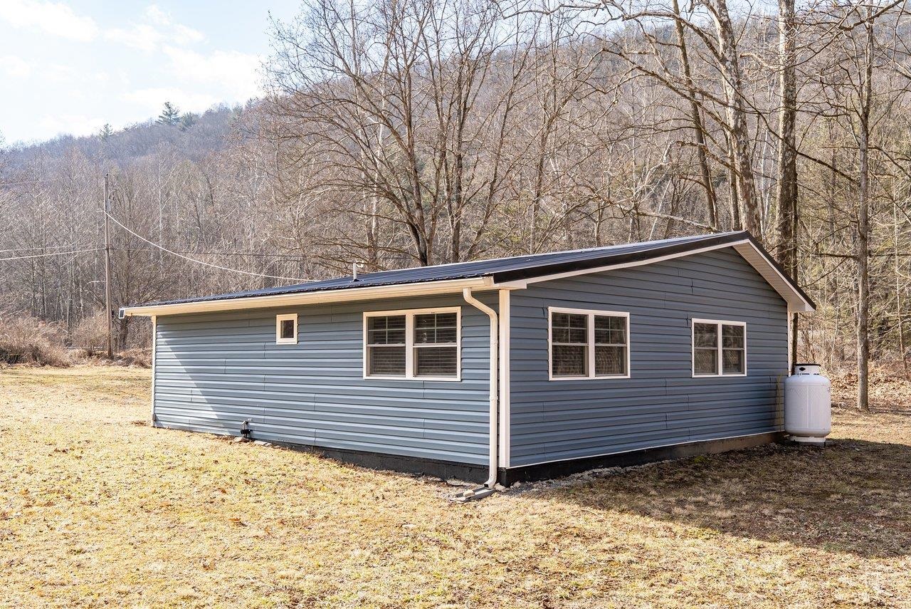 29 Shenandoah Mountain Road Sugar Grove, WV 26815 - Photo 43 of 52 a view of a house and a yard