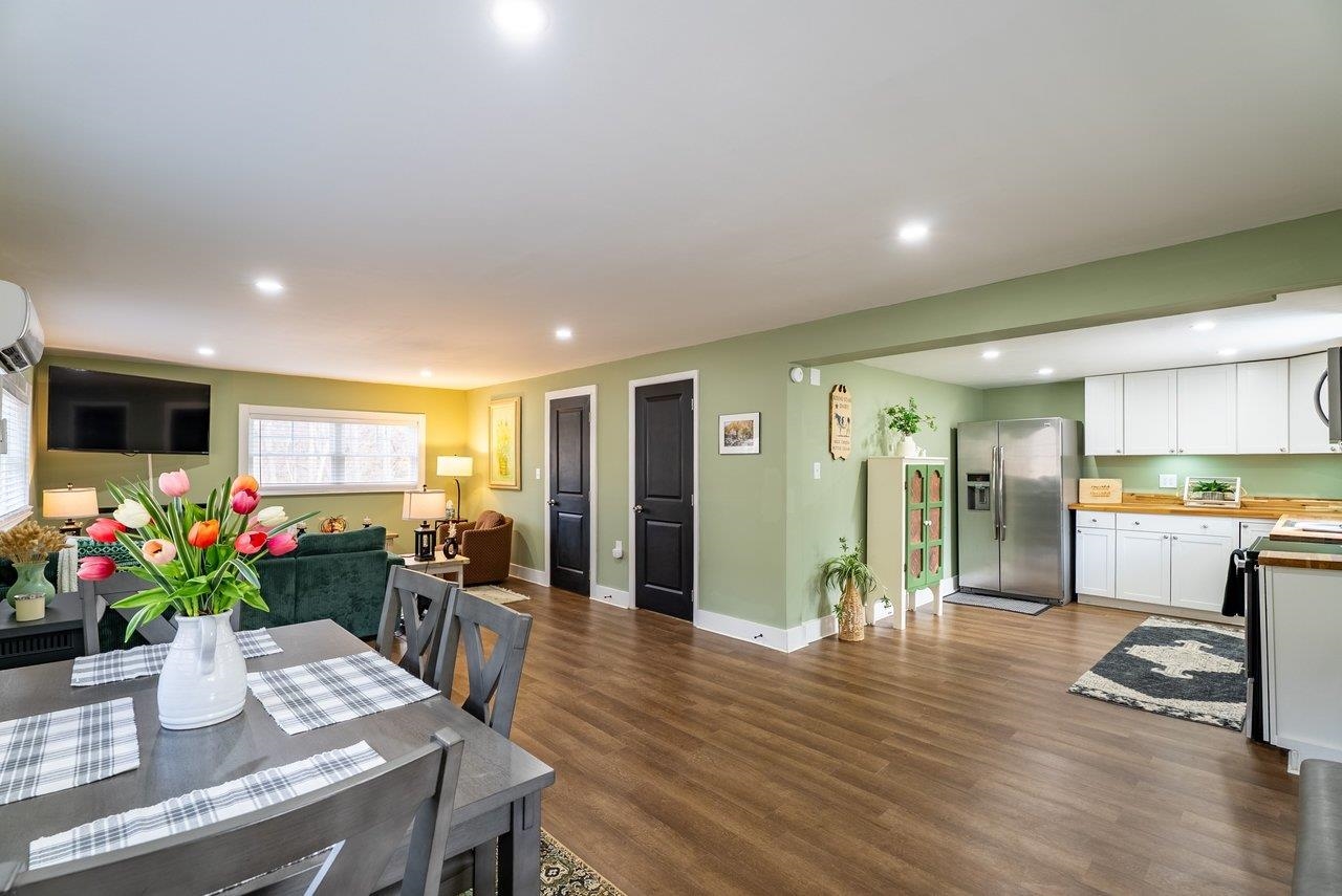 29 Shenandoah Mountain Road Sugar Grove, WV 26815 - Photo 8 of 52 a dining room with furniture and wooden floor