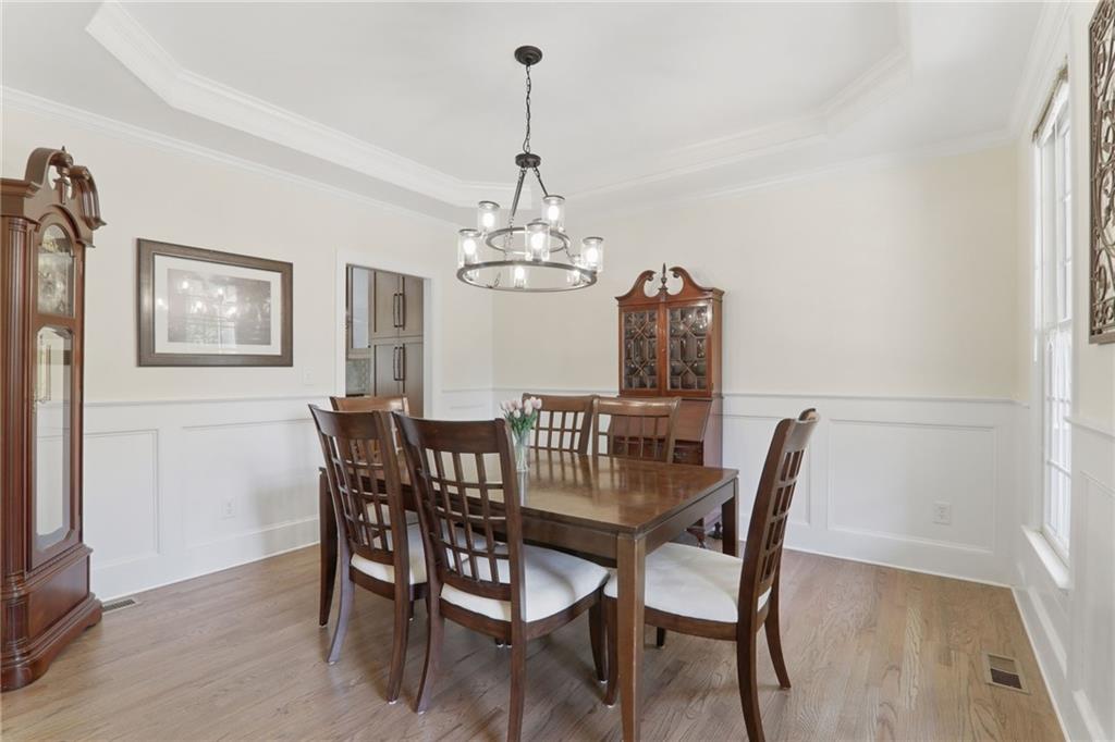 67 Pointer Lane Braselton, GA 30517 - Photo 15 of 74 a view of a dining room with furniture and chandelier