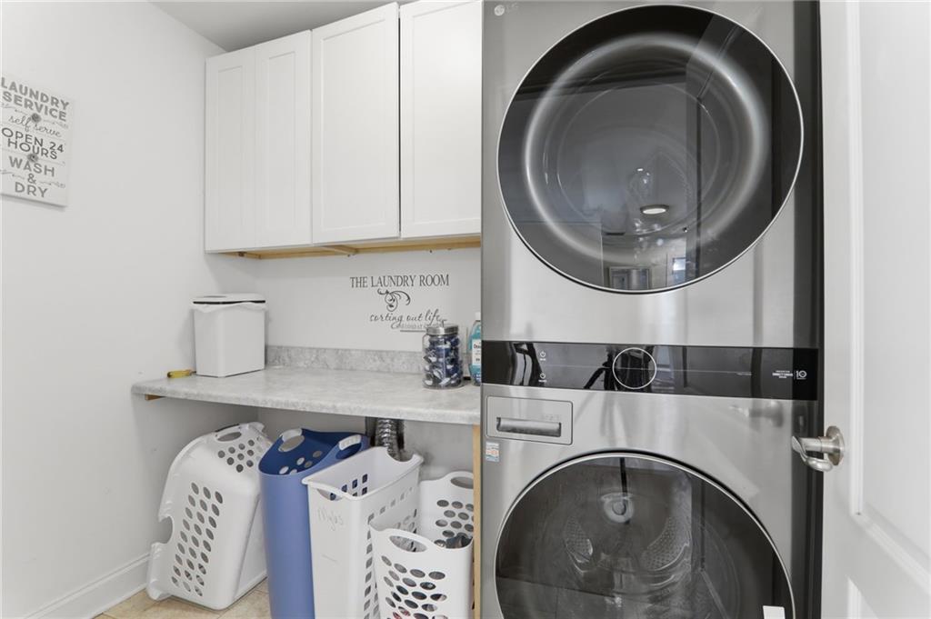 67 Pointer Lane Braselton, GA 30517 - Photo 53 of 74 a utility room with dryer and washer