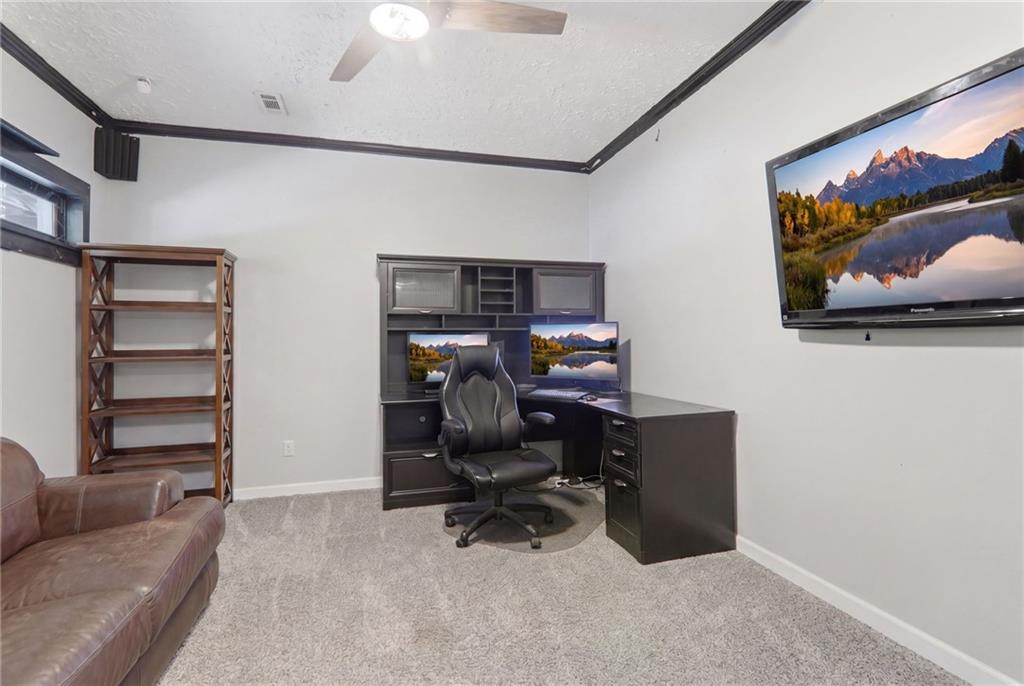 67 Pointer Lane Braselton, GA 30517 - Photo 56 of 74 a view of a livingroom with workspace and a couch