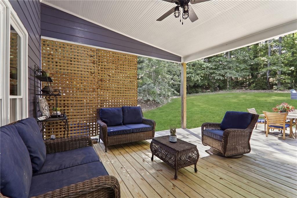67 Pointer Lane Braselton, GA 30517 - Photo 61 of 74 a view of a patio with couches and a table