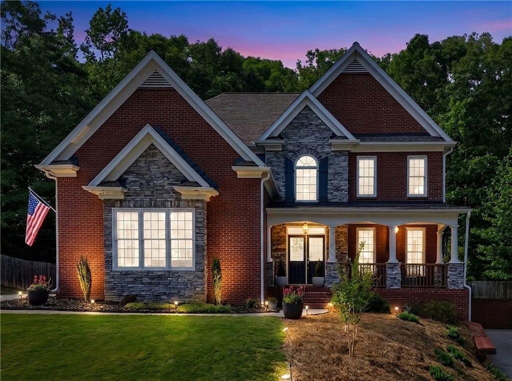 67 Pointer Lane Braselton, GA 30517 - Photo 73 of 74 a front view of a house with a yard