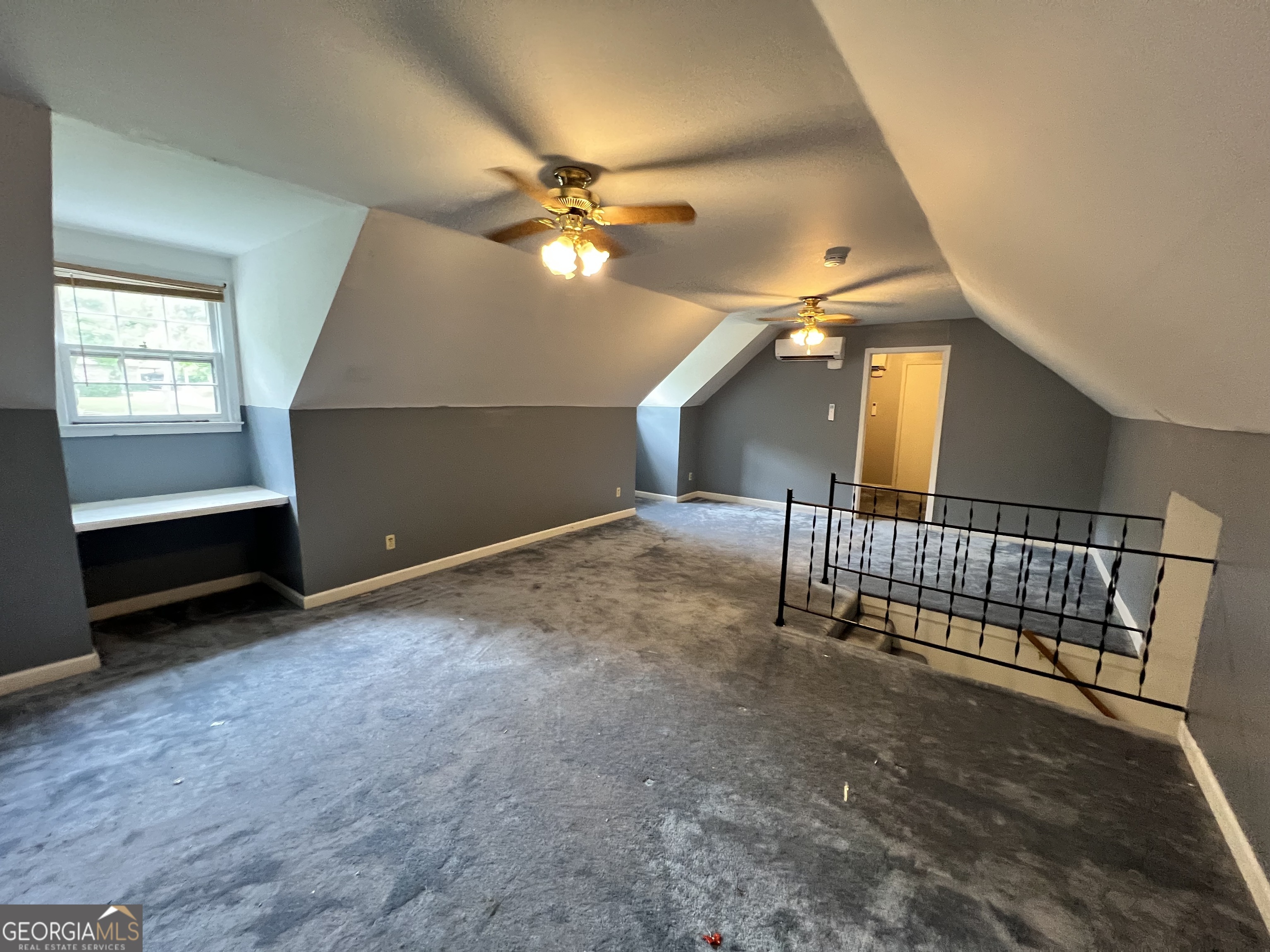 32 Ford Drive Southeast Rome, GA 30161 - Photo 24 of 49 an empty room with windows and fan