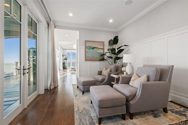 a bathroom with a granite countertop sink a toilet a mirror and shower