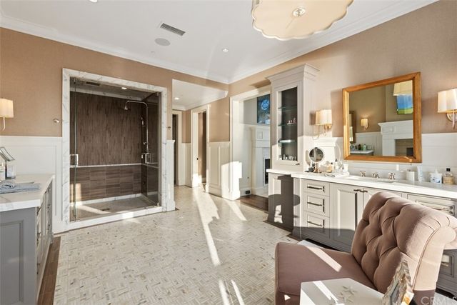 a view of a house with swimming pool and furniture