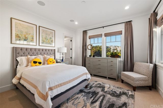 a view of a patio with a table and chairs