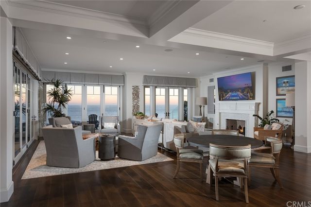 a view of staircase with lots of wooden floor and windows