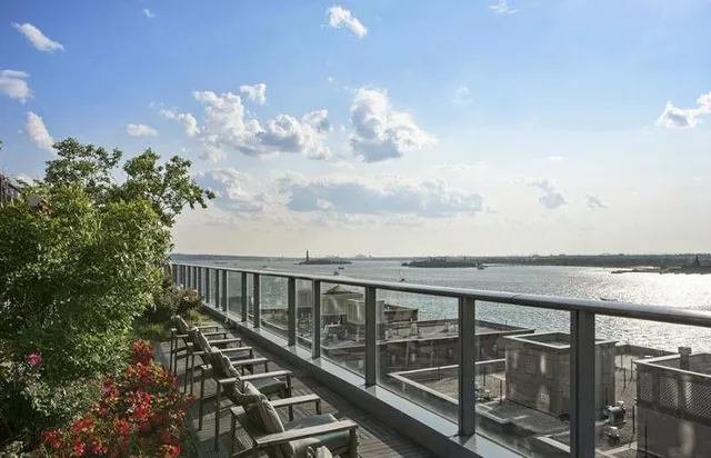 a room with furniture pool table and flat screen tv