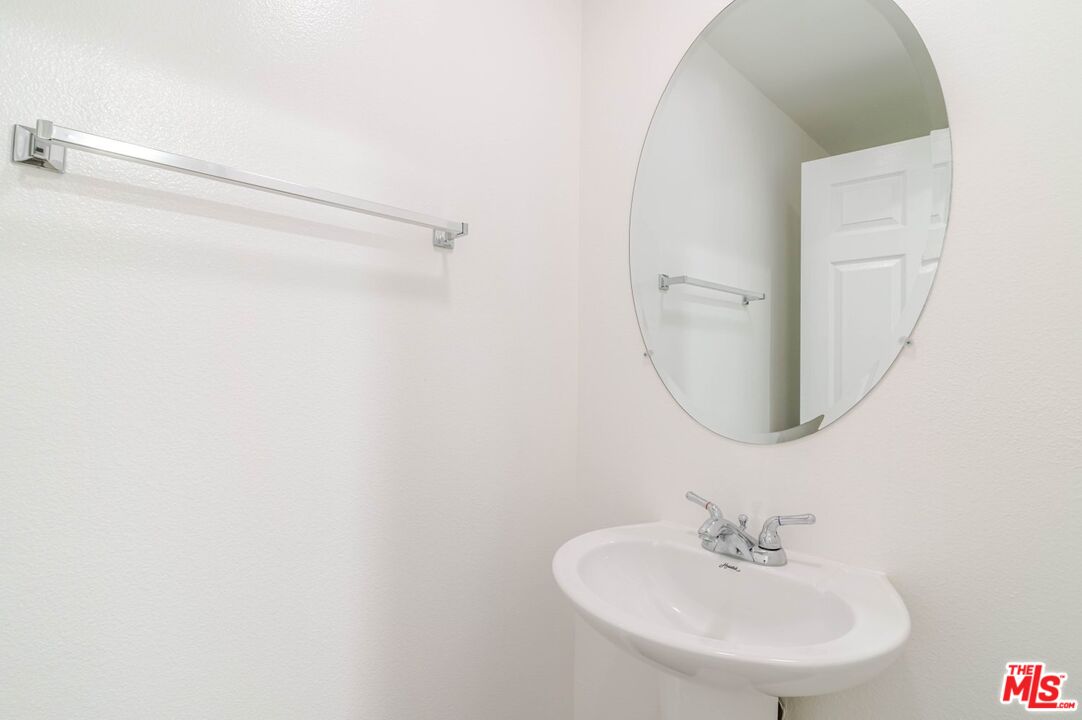 5521 Kester Avenue, Unit 7 Sherman Oaks, CA 91411 - Photo 18 of 45 a bathroom with a sink and a mirror