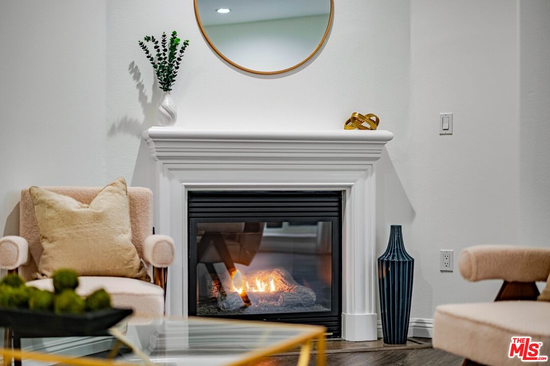 5521 Kester Avenue, Unit 7 Sherman Oaks, CA 91411 - Photo 39 of 45 a living room with furniture and a fireplace