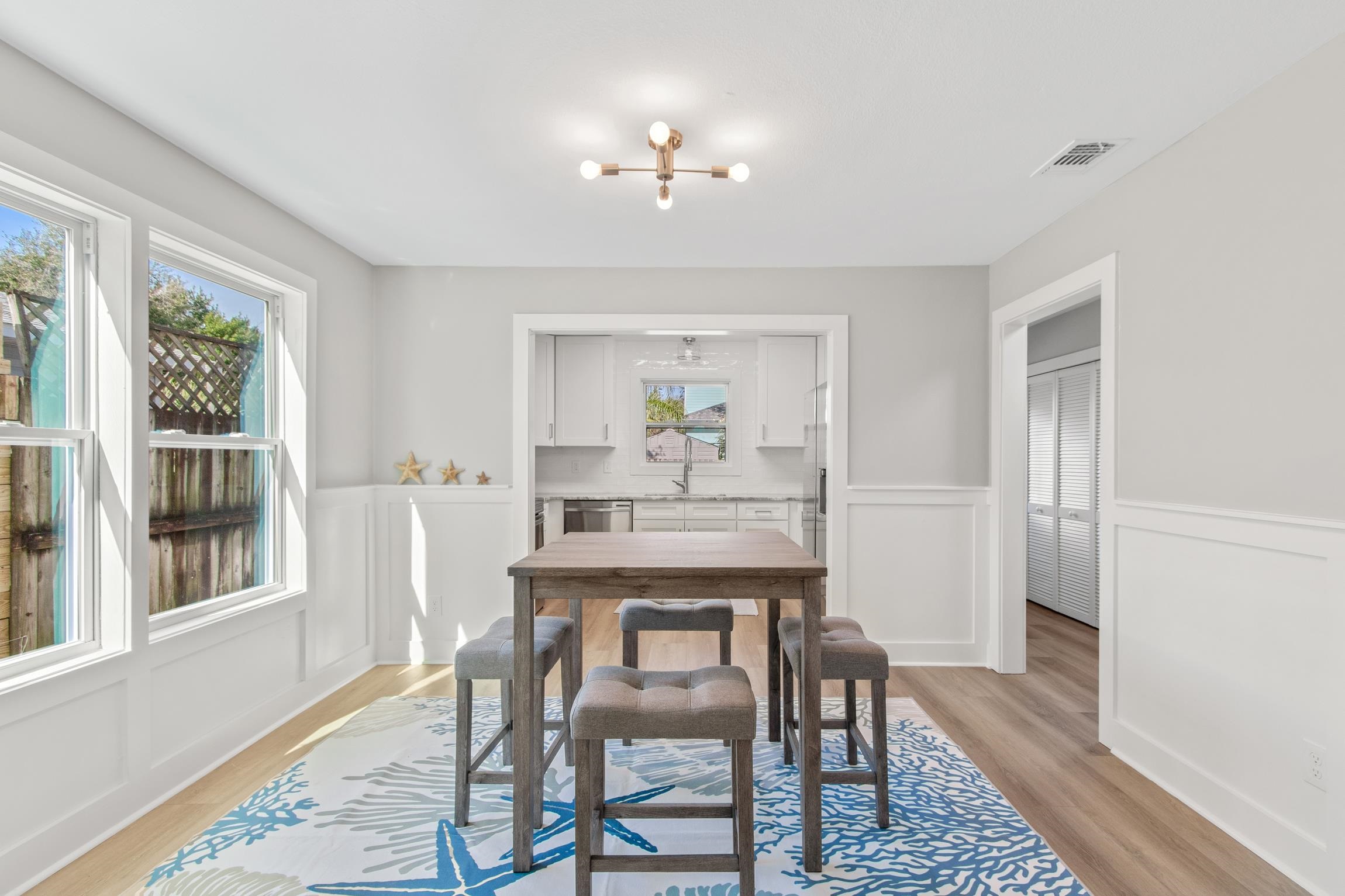 112 2nd Street, Unit A St. Augustine, FL 32080 - Photo 11 of 48 a dining room with furniture and window
