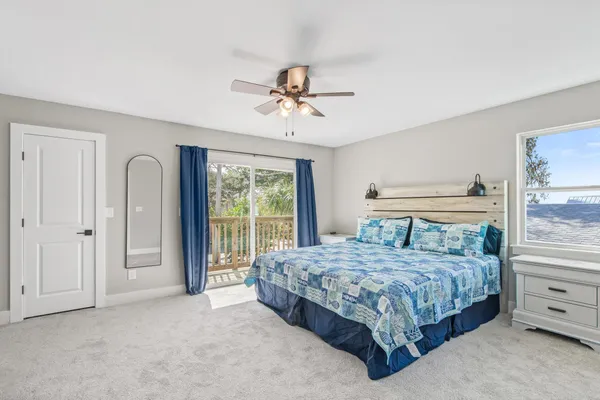 a bedroom with a bed and a table