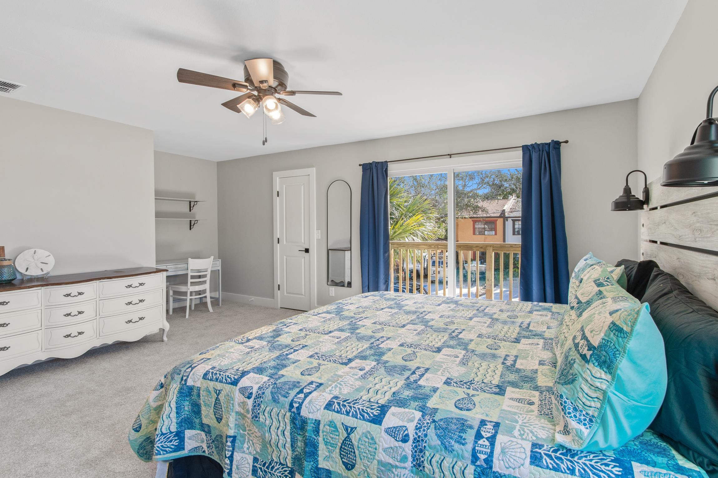 112 2nd Street, Unit A St. Augustine, FL 32080 - Photo 21 of 48 a bedroom with a bed and a window