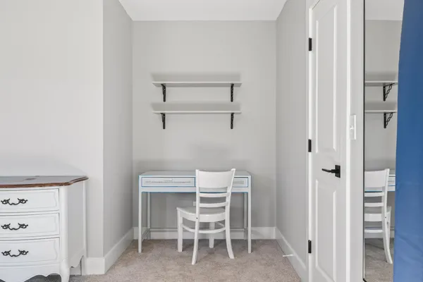 a view of a room with racks on the wall