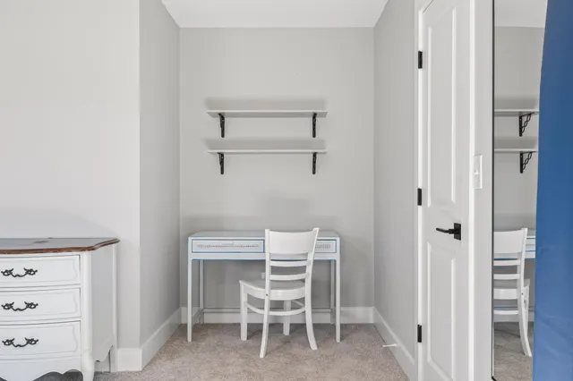 a view of a room with racks on the wall