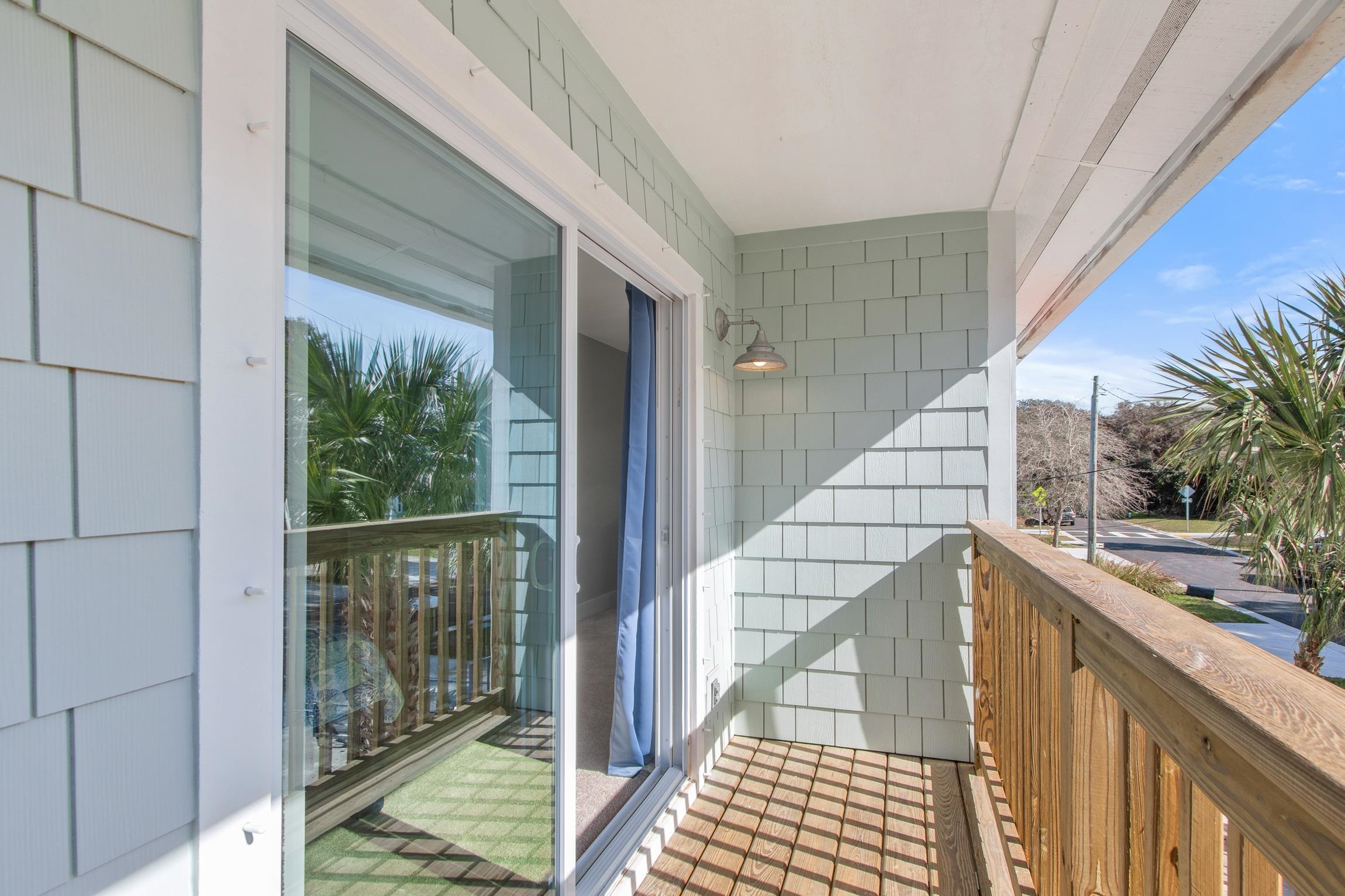 112 2nd Street, Unit A St. Augustine, FL 32080 - Photo 24 of 48 a view of balcony with wooden floor and fence