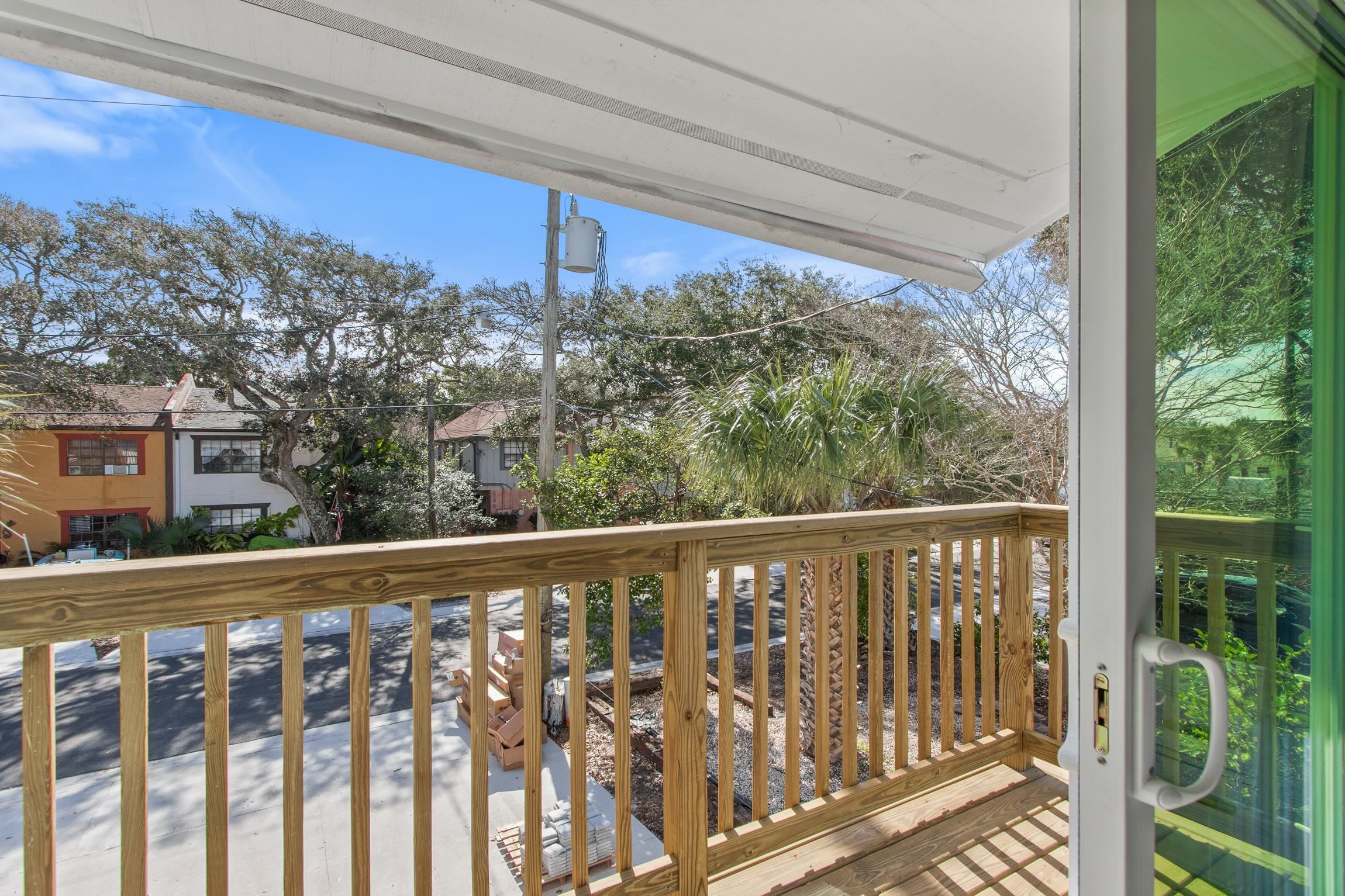 112 2nd Street, Unit A St. Augustine, FL 32080 - Photo 25 of 48 a view of a street from a balcony