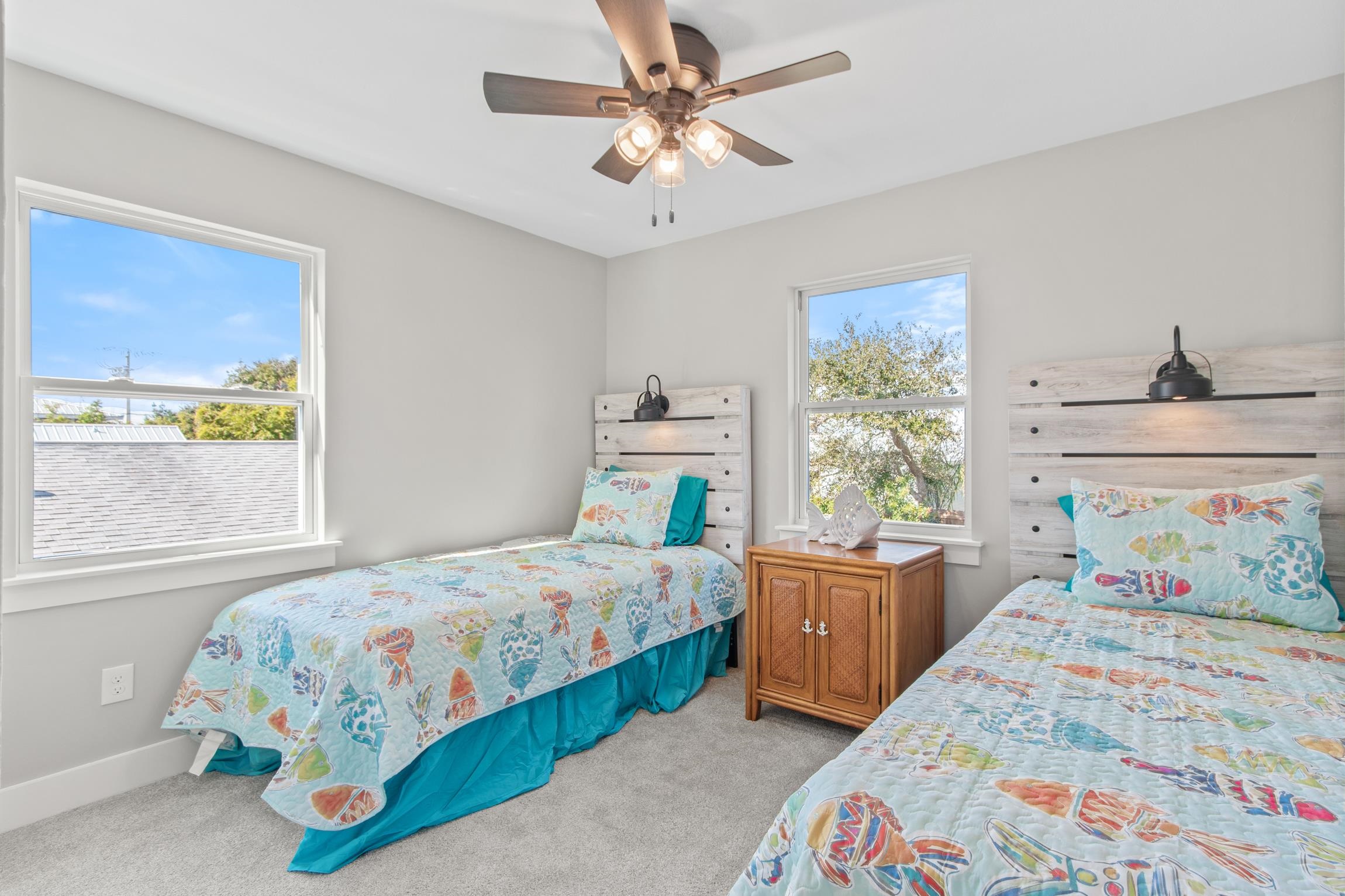 112 2nd Street, Unit A St. Augustine, FL 32080 - Photo 26 of 48 a bedroom with two beds and a window