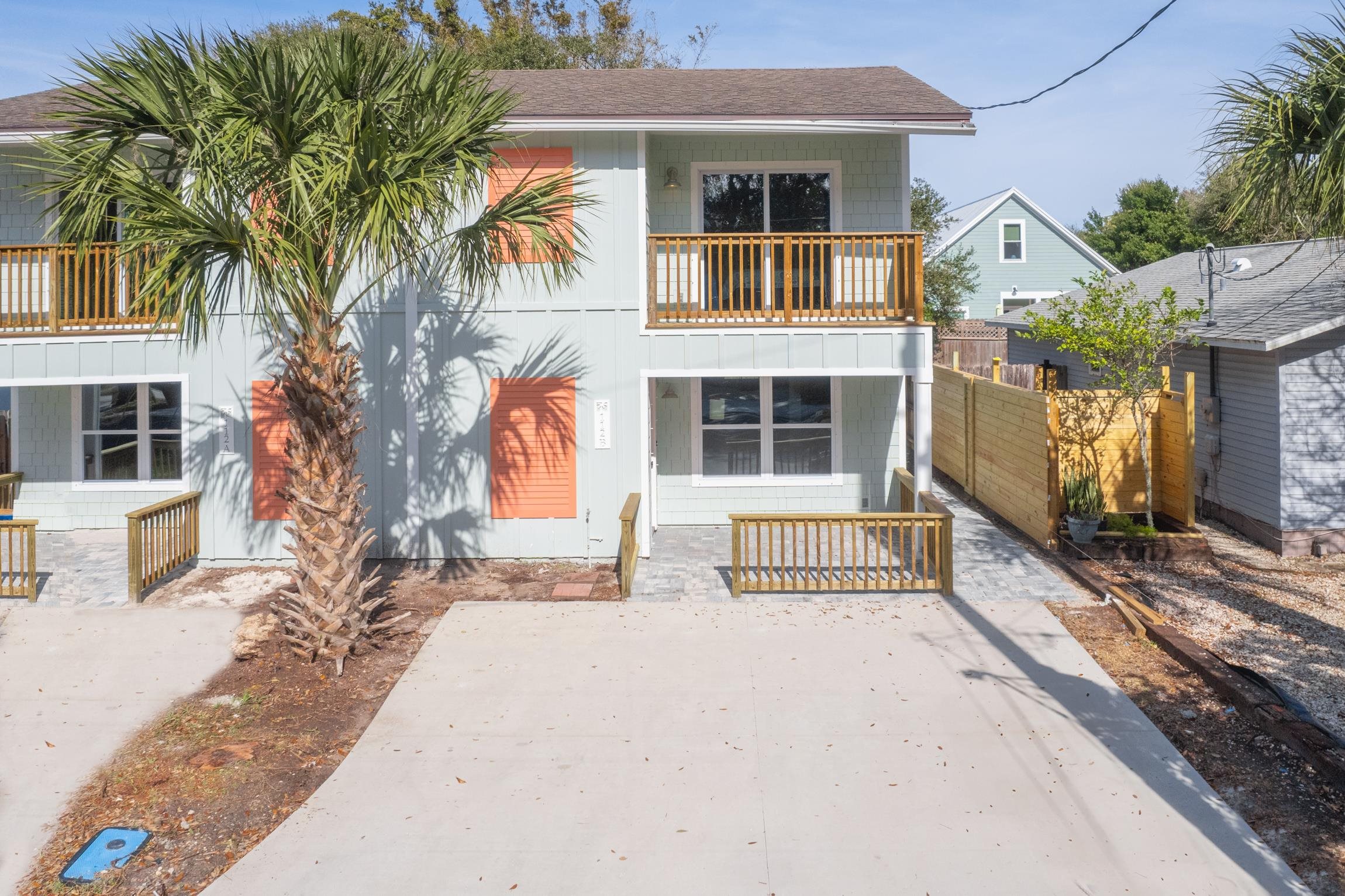 112 2nd Street, Unit A St. Augustine, FL 32080 - Photo 38 of 48 a front view of a house with a yard