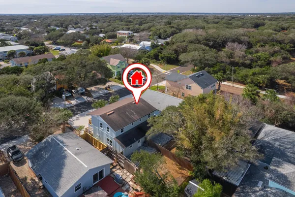 an aerial view of residential house with outdoor space