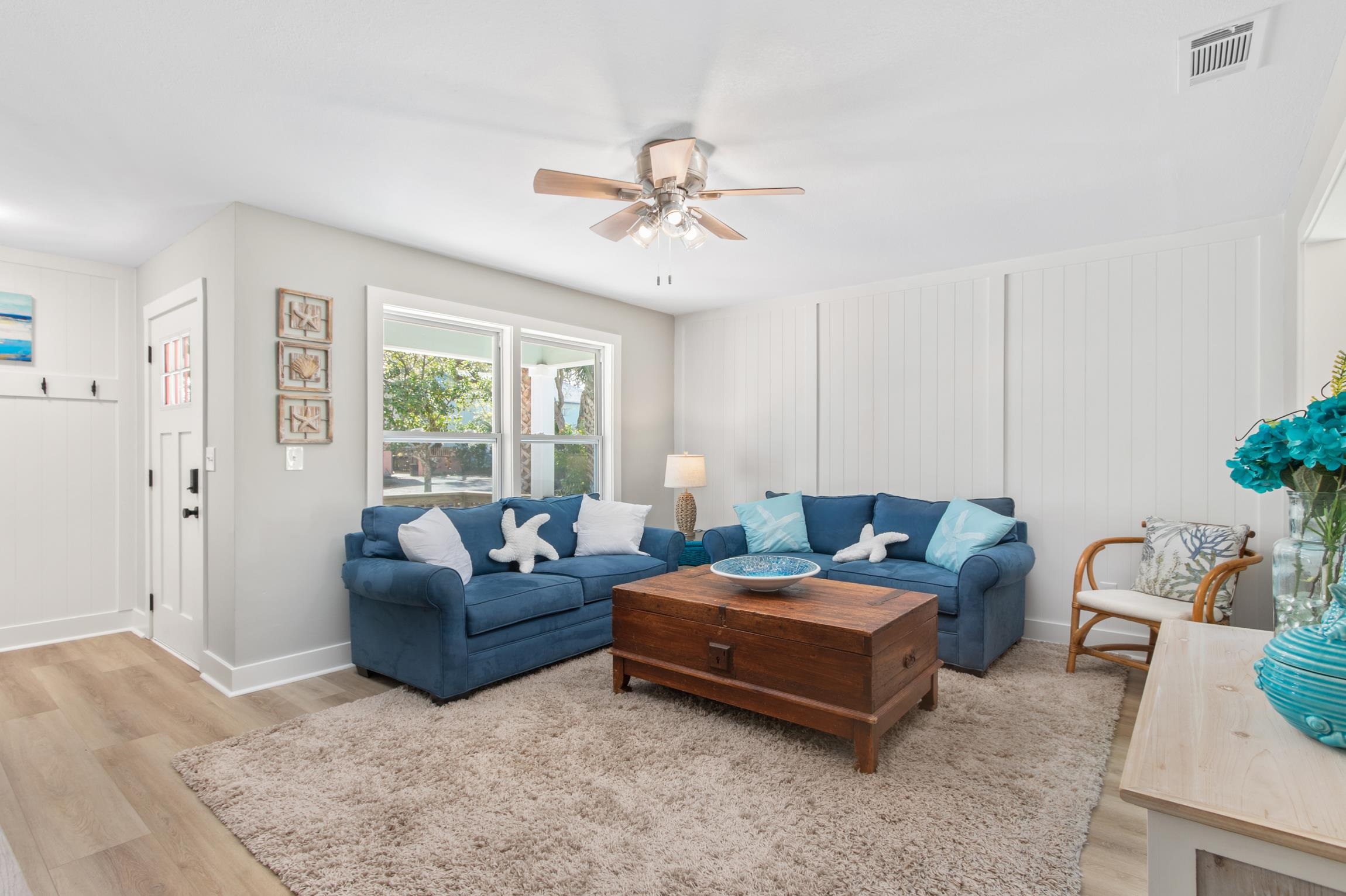 112 2nd Street, Unit A St. Augustine, FL 32080 - Photo 8 of 48 a living room with furniture and a large window