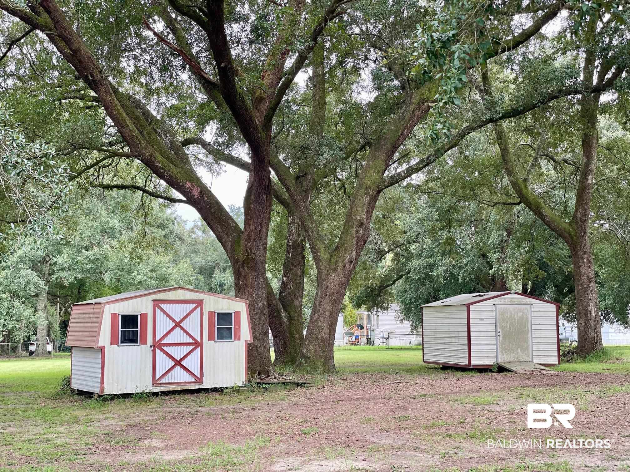 15338 Windbigler Drive Foley, AL 36535 - Photo 22 of 28 View of outdoor structure with a yard