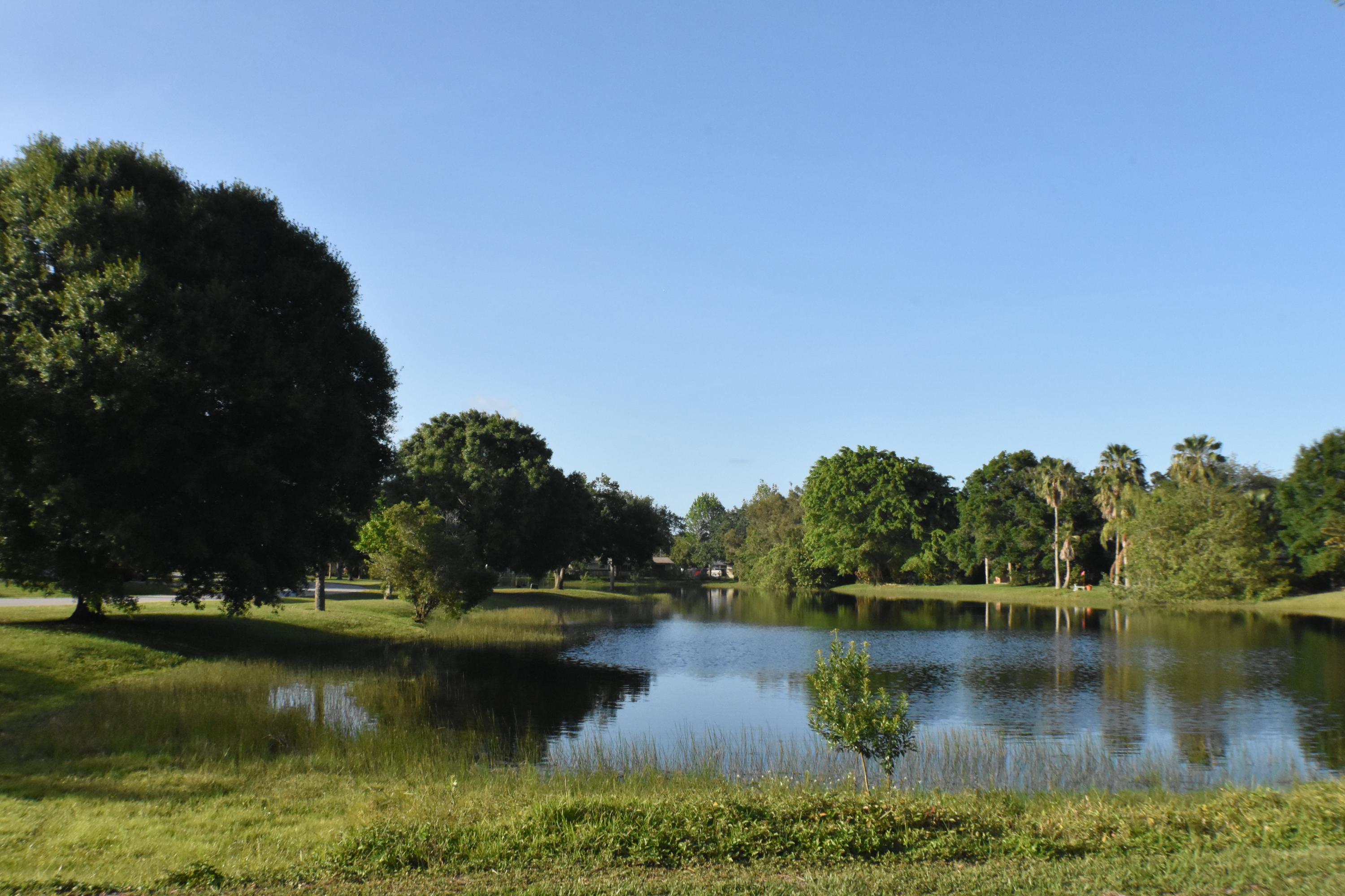 7000 Arthurs Road Fort Pierce, FL 34951 - Photo 3 of 12 Back Yard Lake View