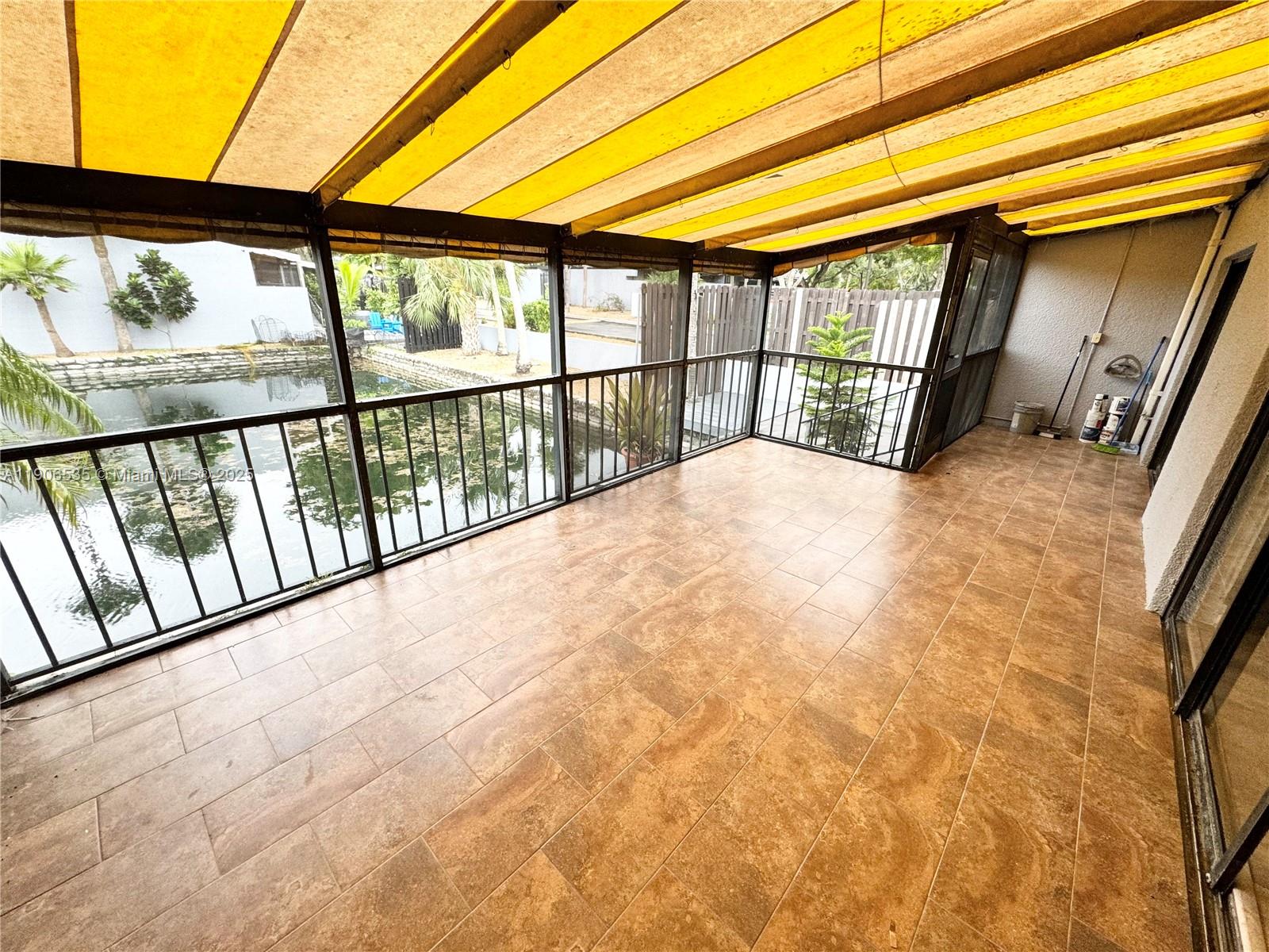 16401 Bridge End Road, Unit 16401 Miami Lakes, FL 33014 - Photo 17 of 19 a view of an empty room