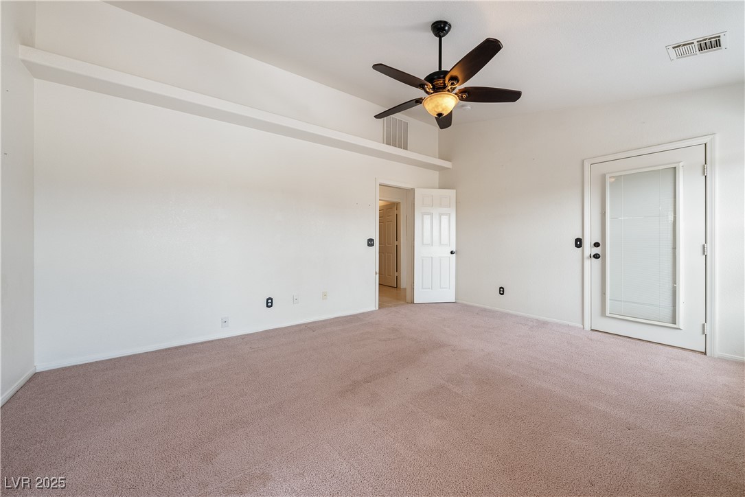 3581 Ranger Way Pahrump, NV 89048 - Photo 29 of 57 Primary Room with light carpet, ceiling fan, and visible vents