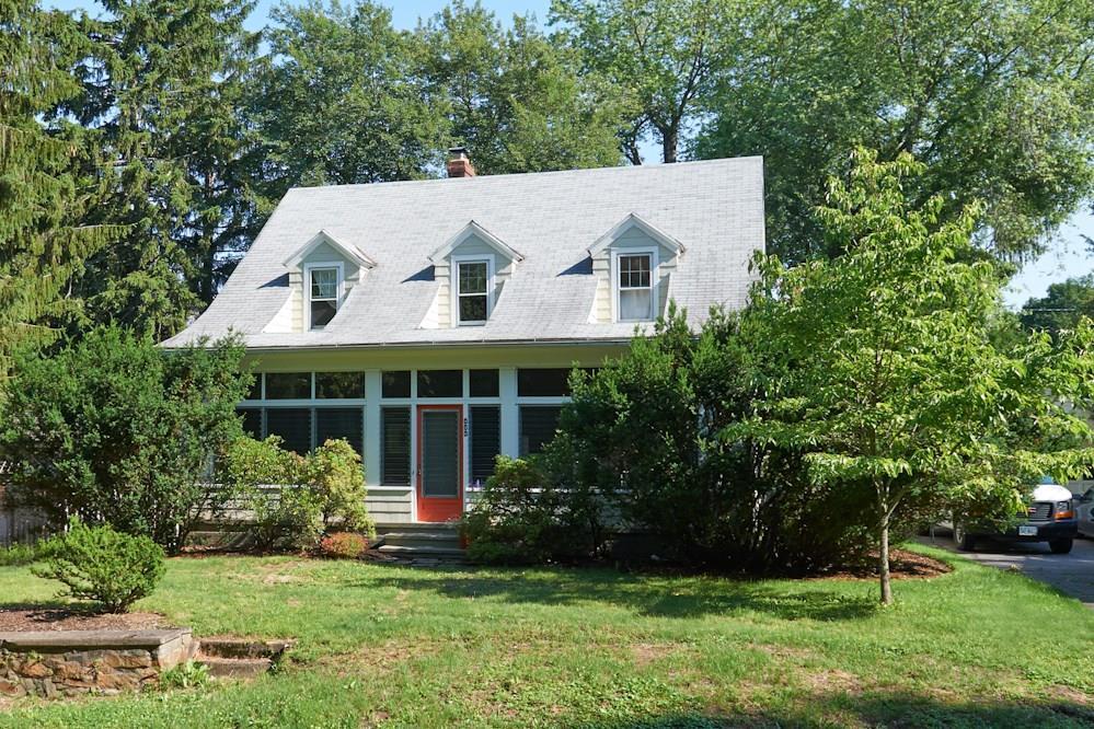 440 North Madison Road Guilford, CT 06437 - Photo 1 of 1 a aerial view of a house with a yard and potted plants
