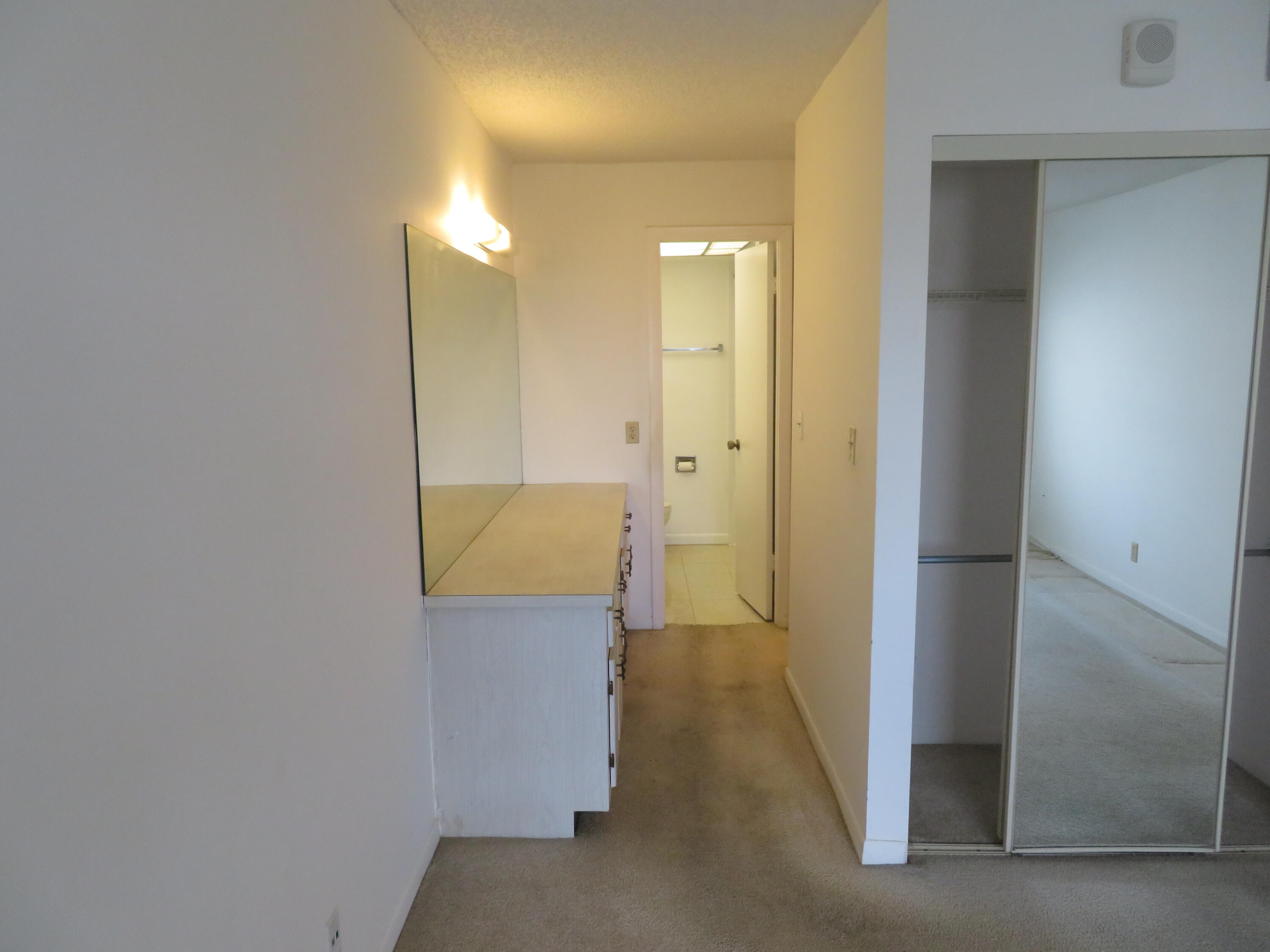 9233 Southwest 8th Street, Unit 419 Boca Raton, FL 33428 - Photo 35 of 41 64_9233-419_Makeup_Vanity