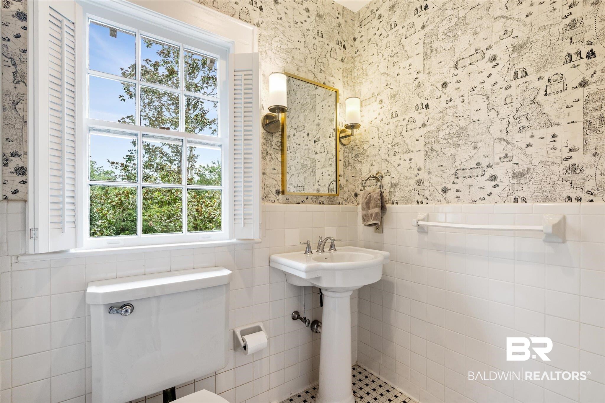2205 Spring Hill Avenue Mobile, AL 36607 - Photo 30 of 59 Bathroom with tile walls, tile patterned floors, and toilet