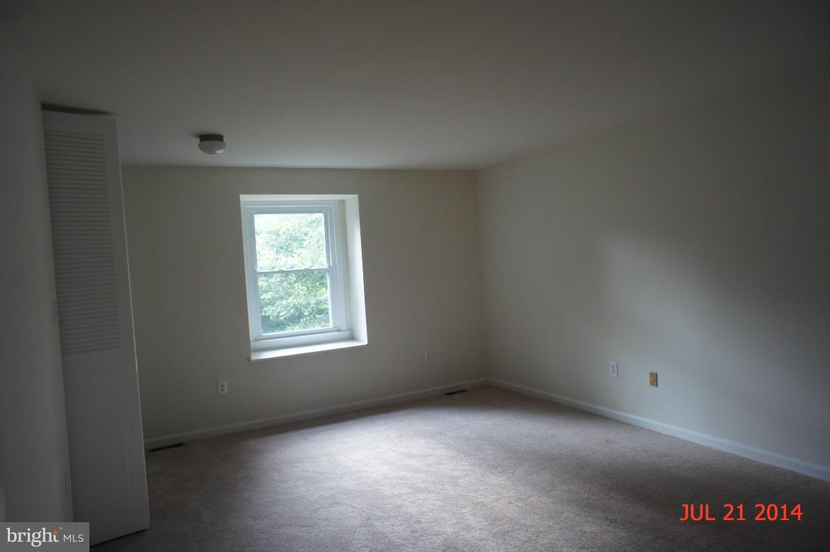 1821 Hatfield Road Huntingtown, MD 20639 - Photo 12 of 18 an empty room with a window
