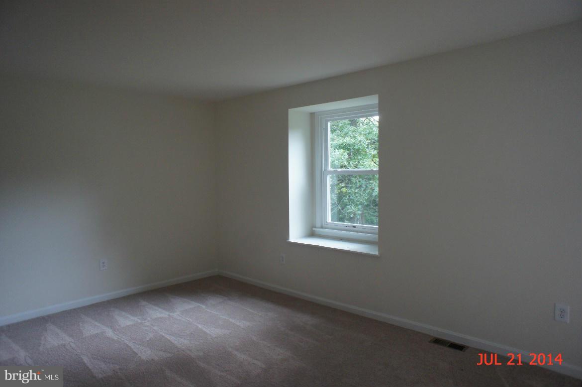 1821 Hatfield Road Huntingtown, MD 20639 - Photo 15 of 18 an empty room with a window