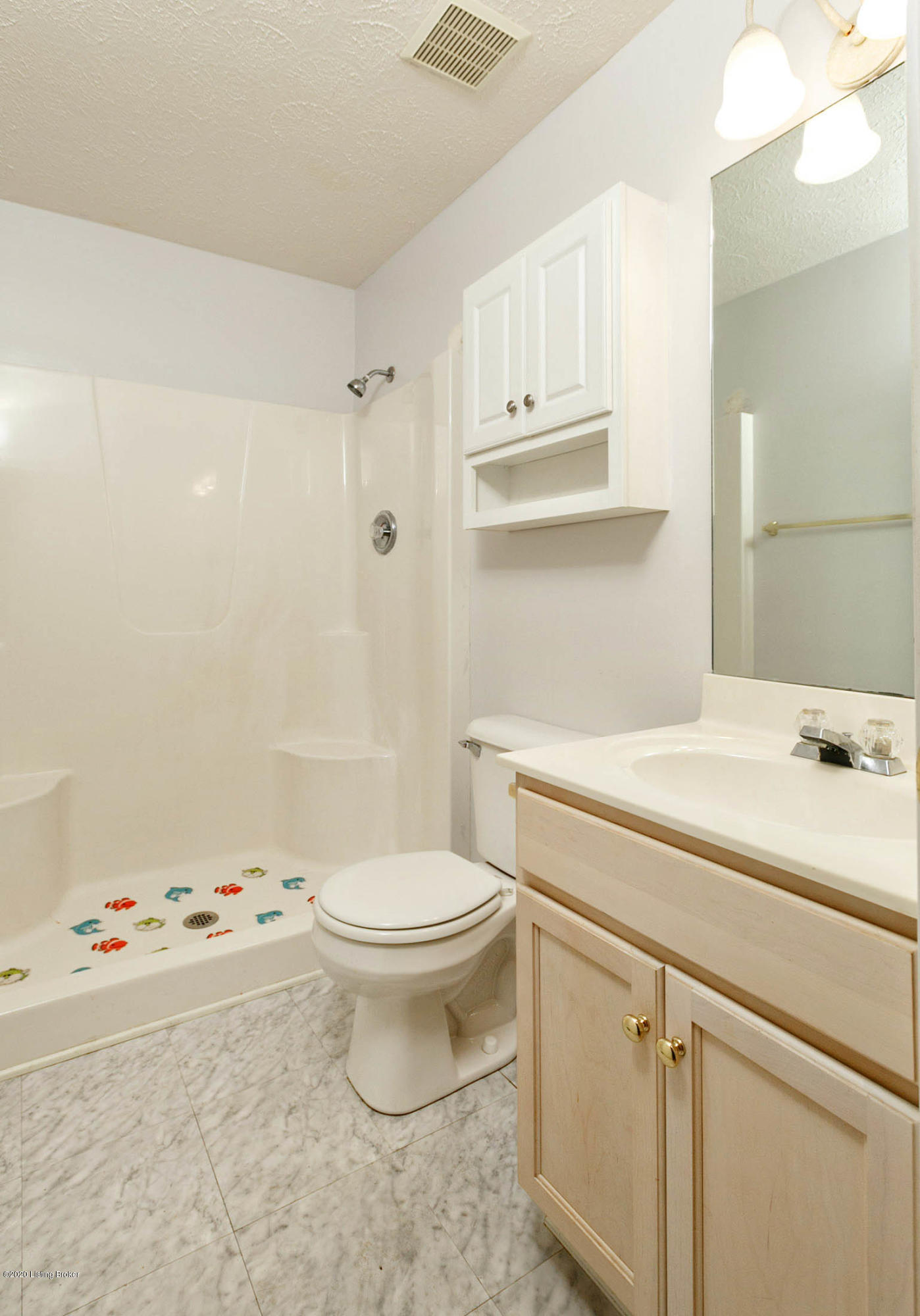 8003 Kellerman Road Louisville, KY 40219 - Photo 19 of 38 Bathroom on the first floor between bedrooms