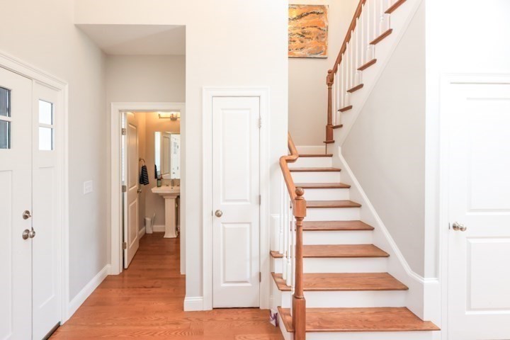 31 Lilac Avenue Bellingham, MA 02019 - Photo 18 of 40 a view of a hallway with wooden floor and entryway