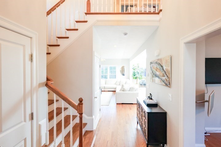 31 Lilac Avenue Bellingham, MA 02019 - Photo 20 of 40 a view of entryway and hall with wooden floor
