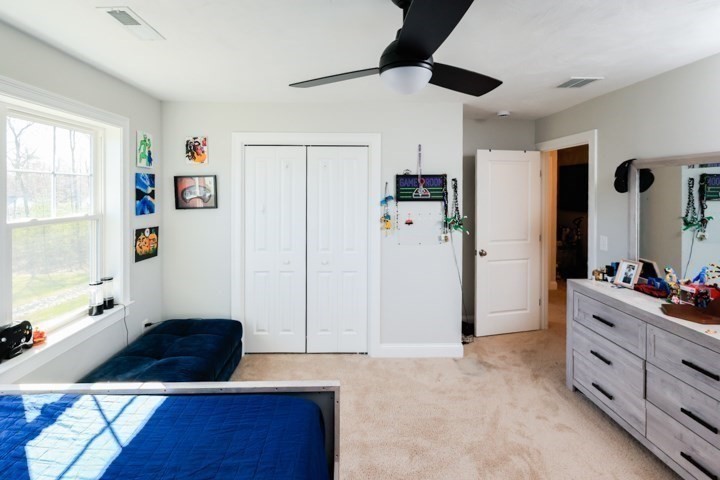 31 Lilac Avenue Bellingham, MA 02019 - Photo 29 of 40 a room with a refrigerator and a dresser