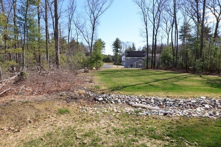 31 Lilac Avenue Bellingham, MA 02019 - Photo 38 of 40 a front view of a house with a yard