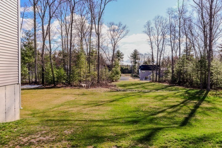 31 Lilac Avenue Bellingham, MA 02019 - Photo 39 of 40 a swimming pool with an outdoor space and seating area