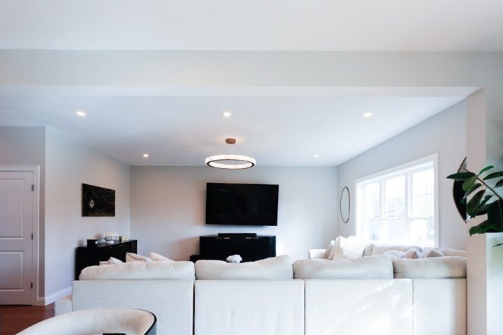 31 Lilac Avenue Bellingham, MA 02019 - Photo 10 of 40 a living room with furniture and a flat screen tv