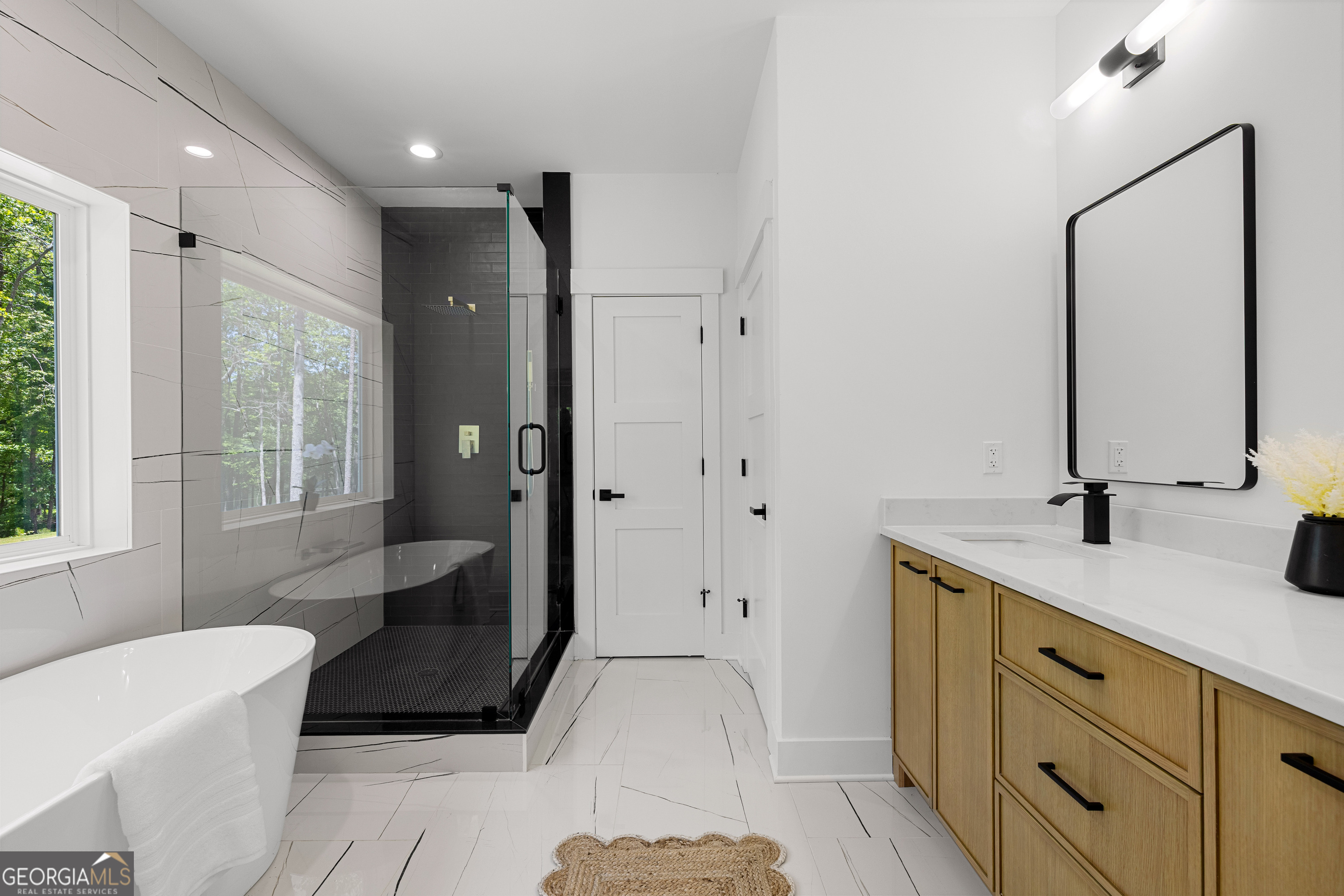 354 Turner Road Newnan, GA 30263 - Photo 42 of 79 a spacious bathroom with a tub shower and sink