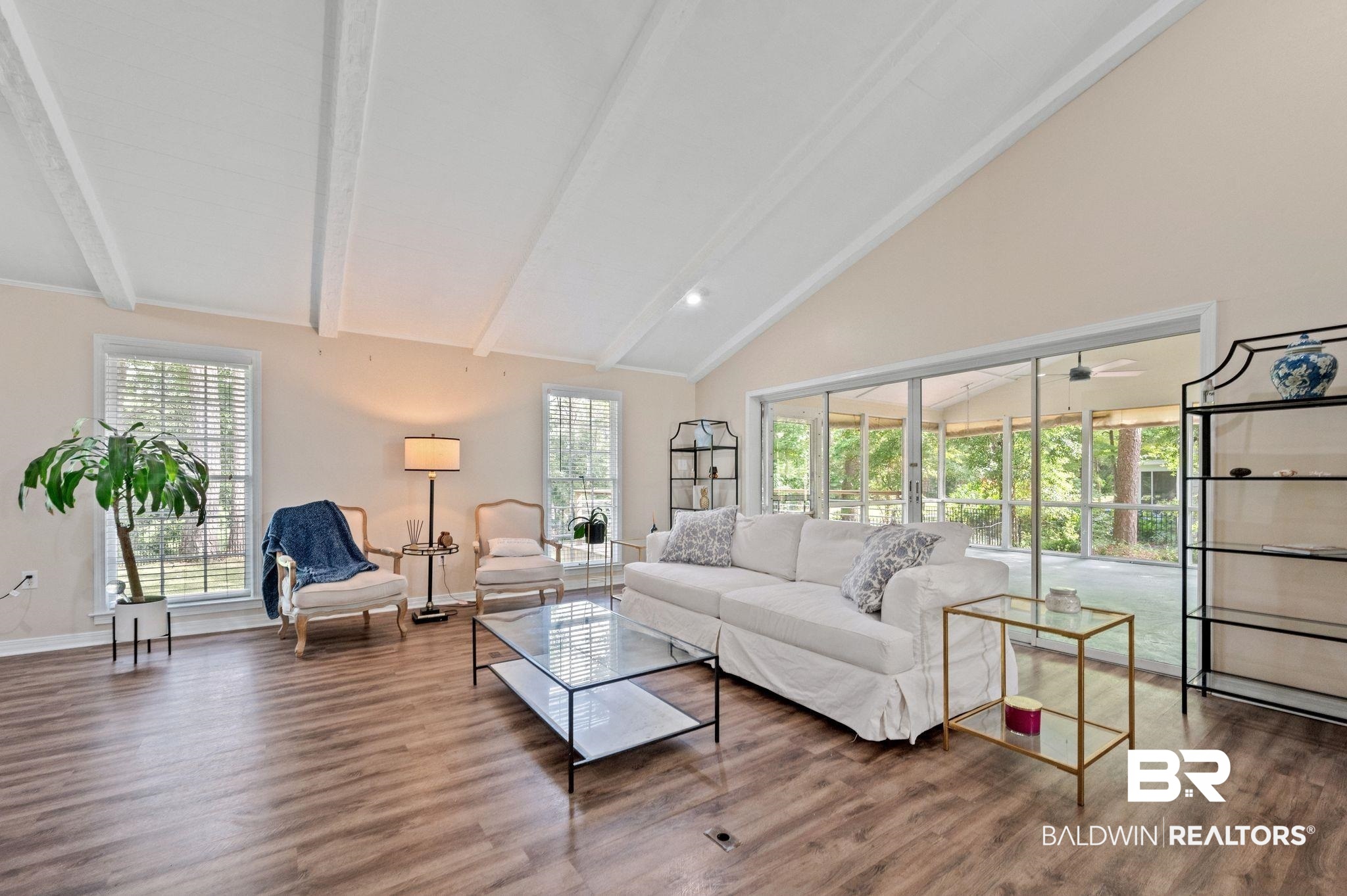 110 Ferncliff Circle Daphne, AL 36526 - Photo 9 of 40 Living room featuring beam ceiling, wood finished floors, high vaulted ceiling, ceiling fan, and baseboards