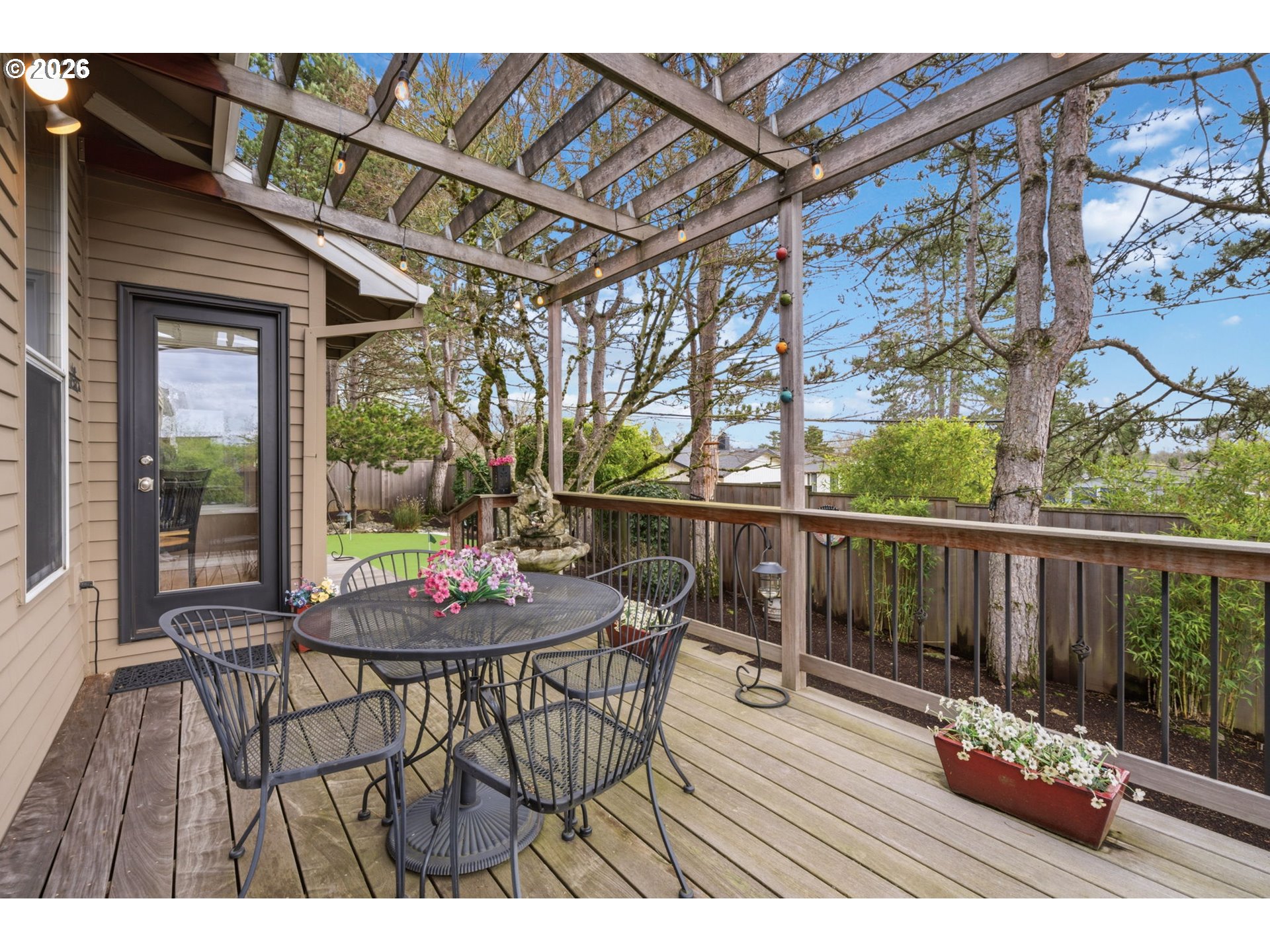 6108 Southwest Kruse Ridge Drive Portland, OR 97219 - Photo 37 of 42 a view of a patio with wooden floor