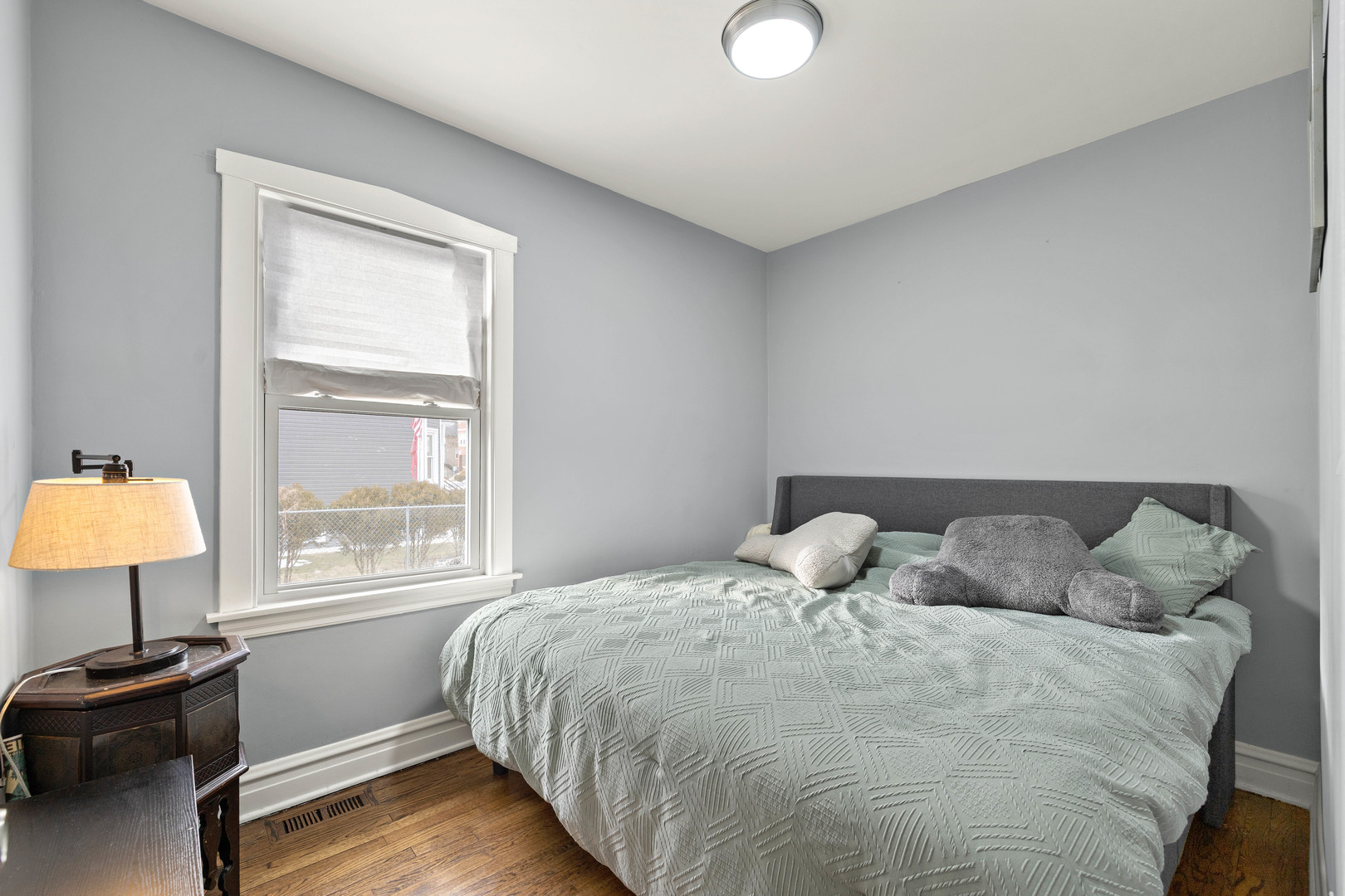 7535 West 61st Street Summit Argo, IL 60501 - Photo 16 of 28 a bedroom with a bed and a window