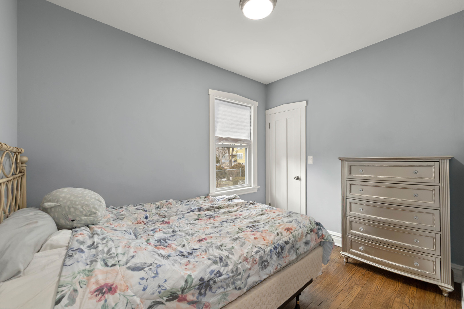 7535 West 61st Street Summit Argo, IL 60501 - Photo 17 of 28 a bedroom with a bed and a window