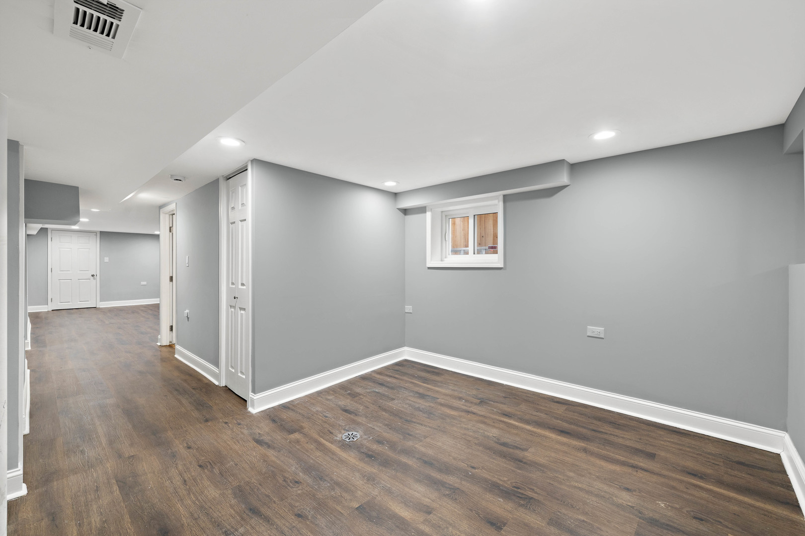 7535 West 61st Street Summit Argo, IL 60501 - Photo 21 of 28 a view of a big room with wooden floor and windows