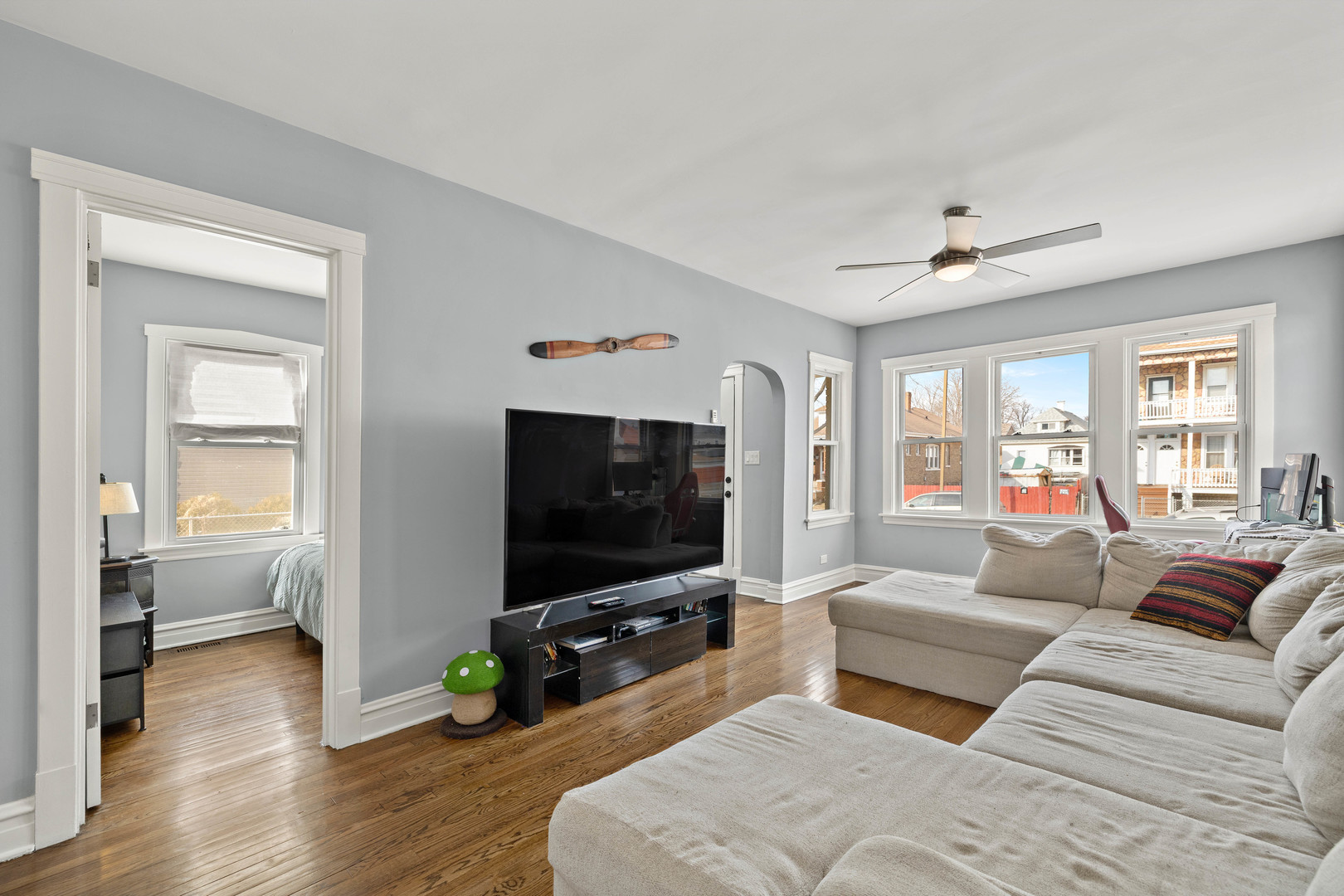 7535 West 61st Street Summit Argo, IL 60501 - Photo 8 of 28 a living room with furniture and a flat screen tv